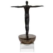 MAN FINDING BALANCE SCULPTURE